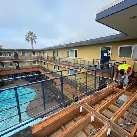 Pool deck demolition at an apartment courtyard in Orange County
