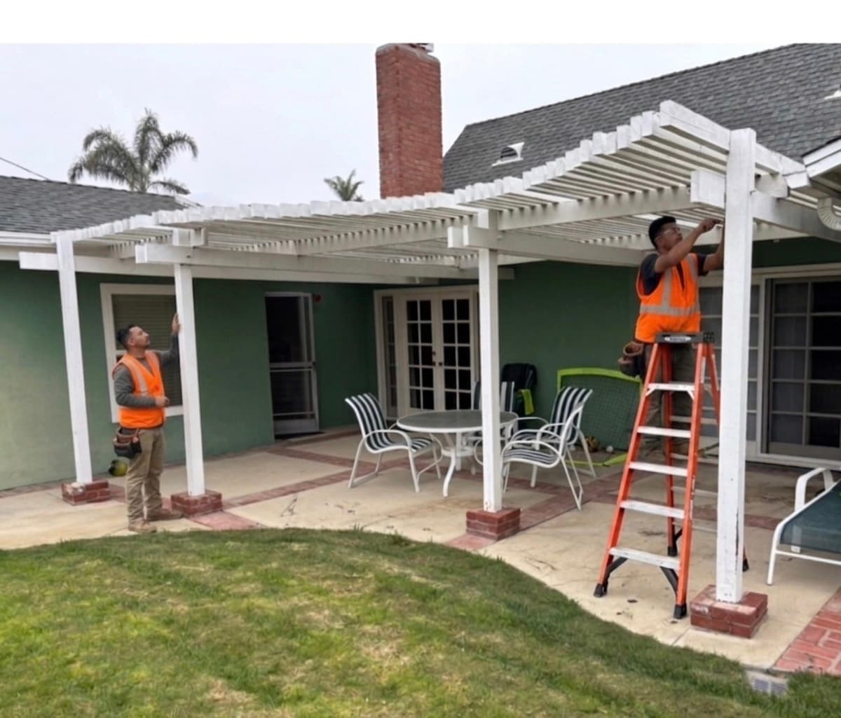 Backyard patio cover demolition at an Orange County home