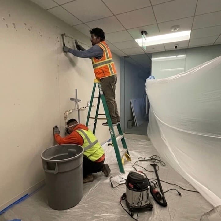 Commercial interior demolition with dust containment and cleanup